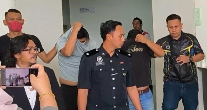 Dua polis trafik peras ugut, pukul warga asing ditahan