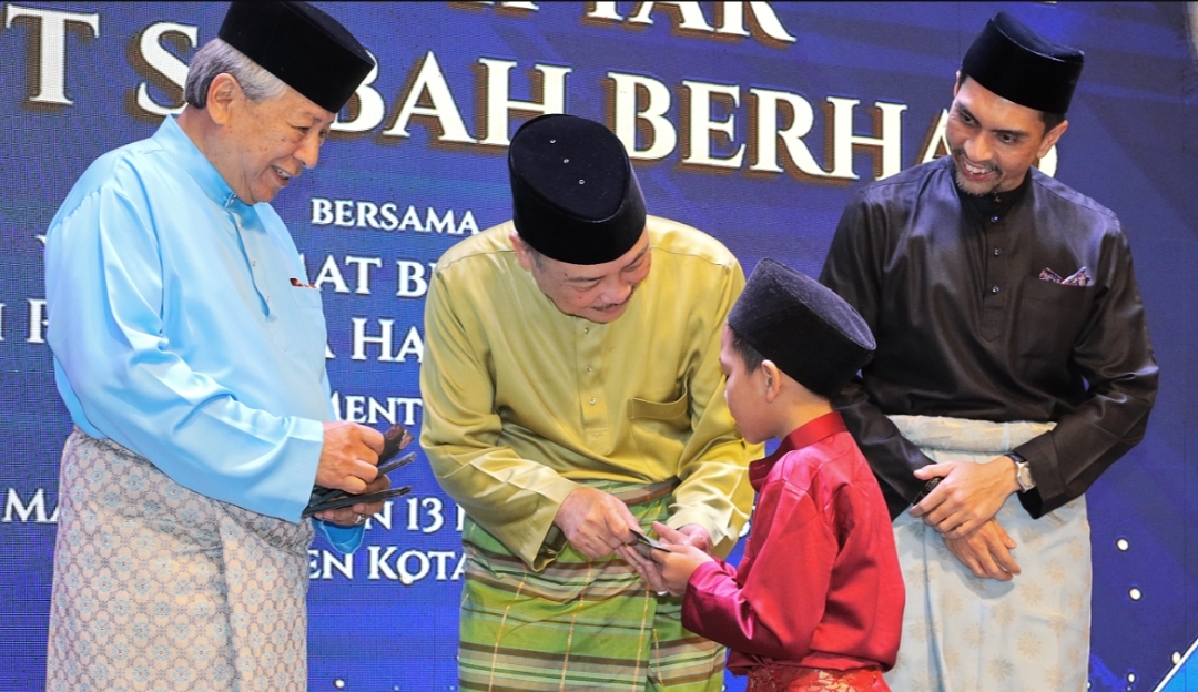 Invest Sabah presents contribution to orphans and Tahfiz students