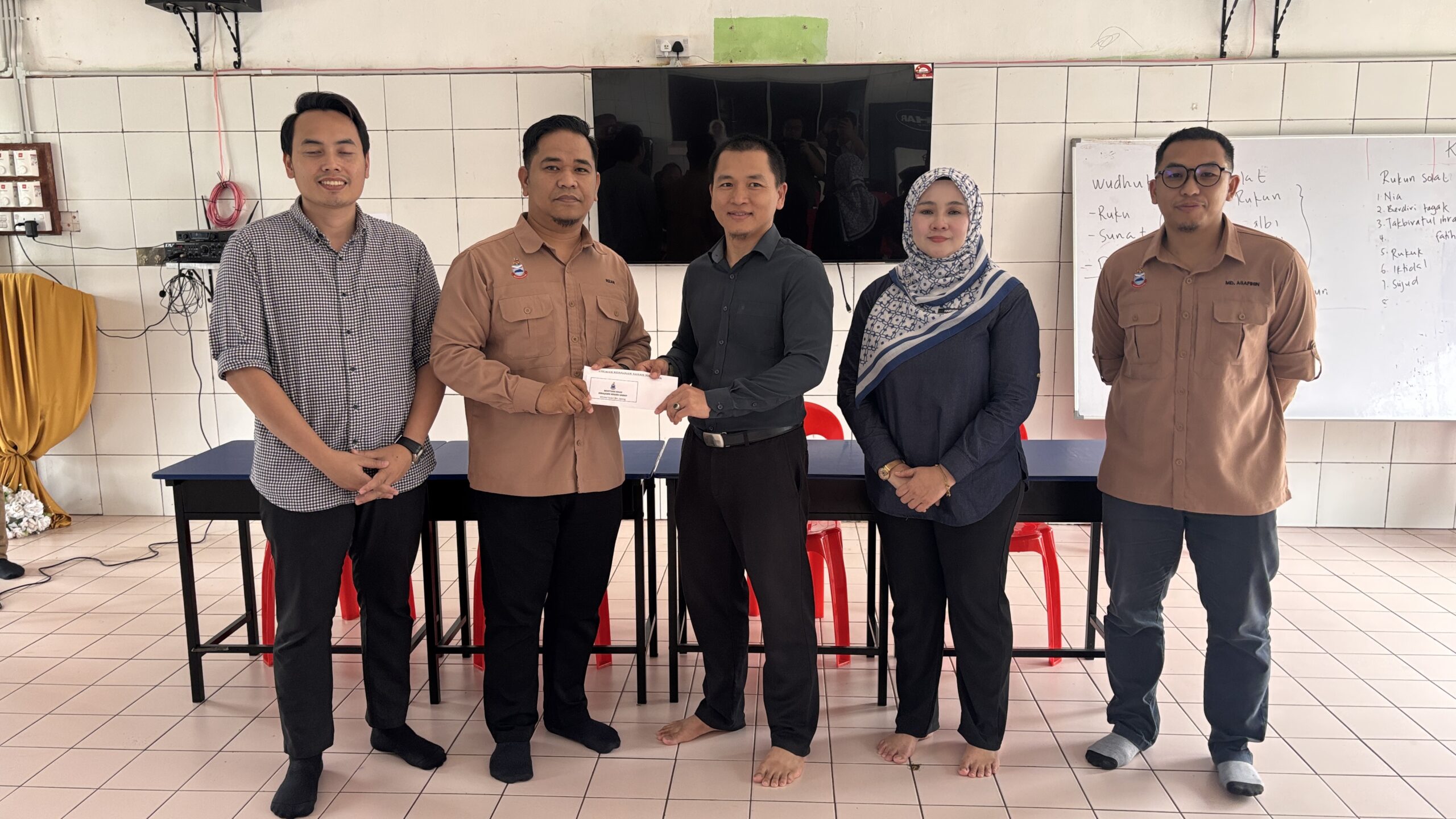 K’jaan Negeri bantu mangsa kebakaran SAN Pekan Tambunan