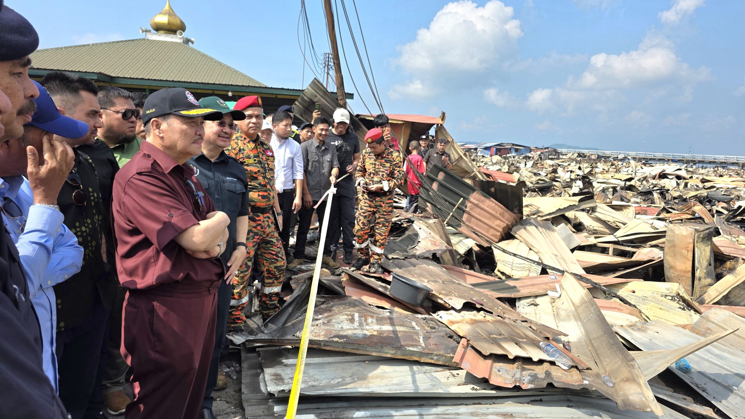 CM visits site, hands over special aid to Kg Bahagia fire victims